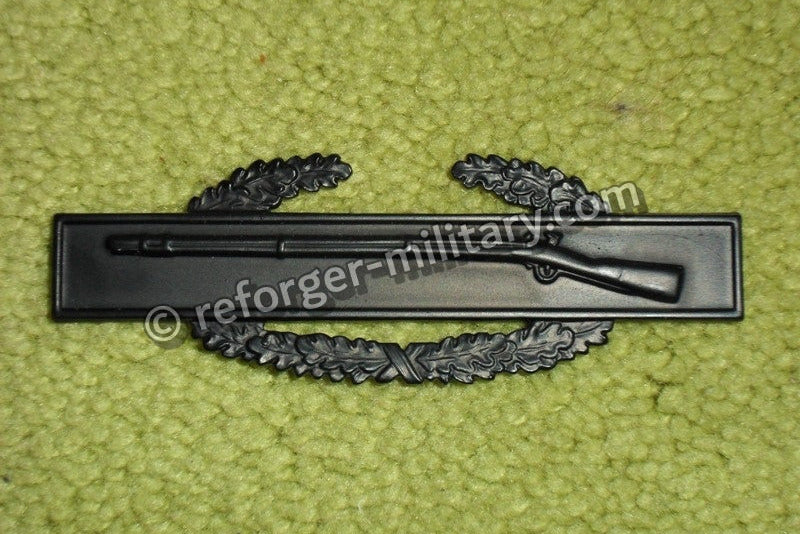Combat Infantry Badge 1st Award Army CIB Anstecker. Matt schwarz brüniert, Metall-Ausführung.