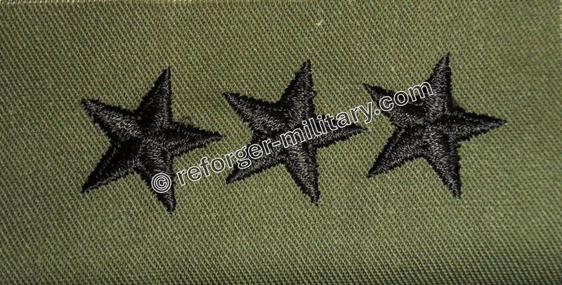 US Army Dienstgrad mit drei schwarzen Sternen, symbolisch für den Rang eines Brigade-Generals