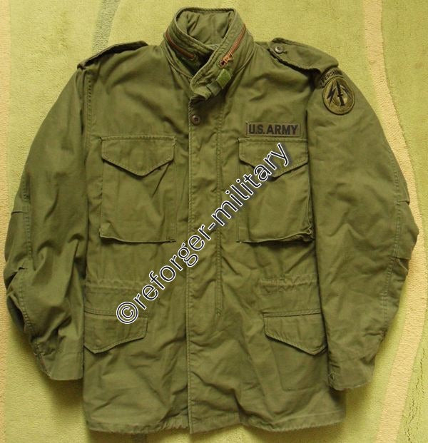 M65 Field Jacket Oliv Medium Long – Vorderansicht, sehr gut gebraucht mit Pershing Missile Unit Patch