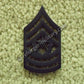 U.S. Army Command Sergeant Major (CSM) Rangabzeichen aus Metall – Subdued Rank Insignia with Wreath for BDU Uniform.