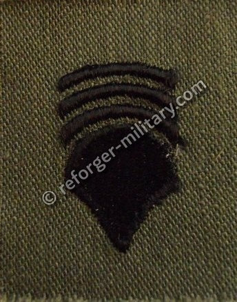 U.S. Army Specialist 7 (SP7) Rangabzeichen Aufnäher – Subdued Olive Rank Patch Vietnam Era E-7 Grade.