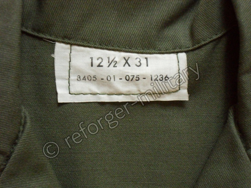 Detailansicht des originalen Labels mit der Grössenangabe 12.5 x 31